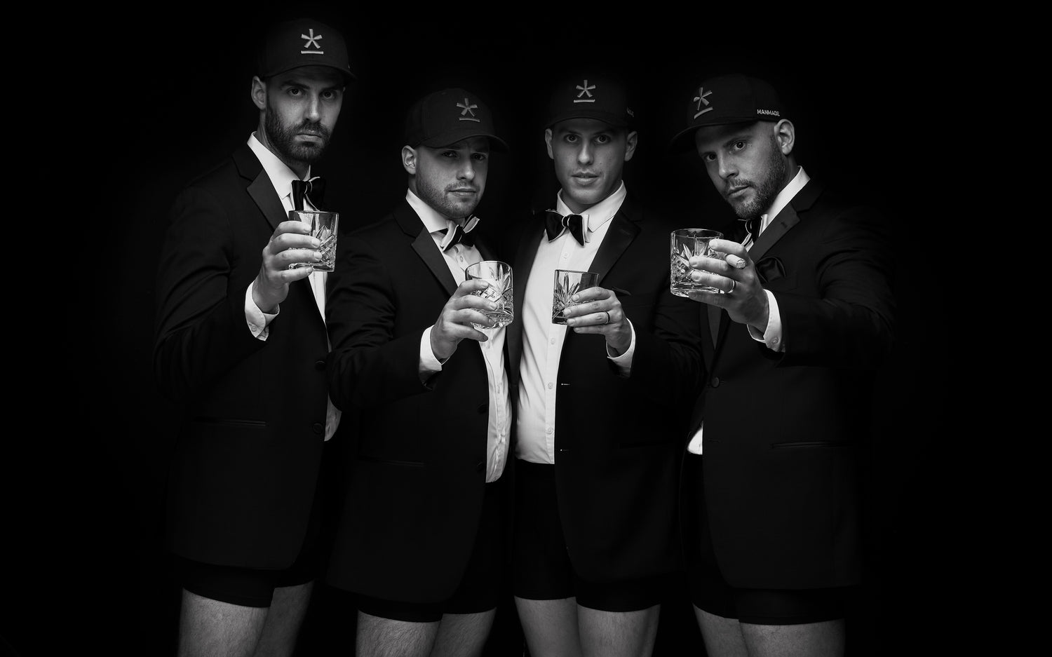 The gentlemen's club: Phil, Rob, Berto and Ant holding a cup of glass on their Manmade boxer brief