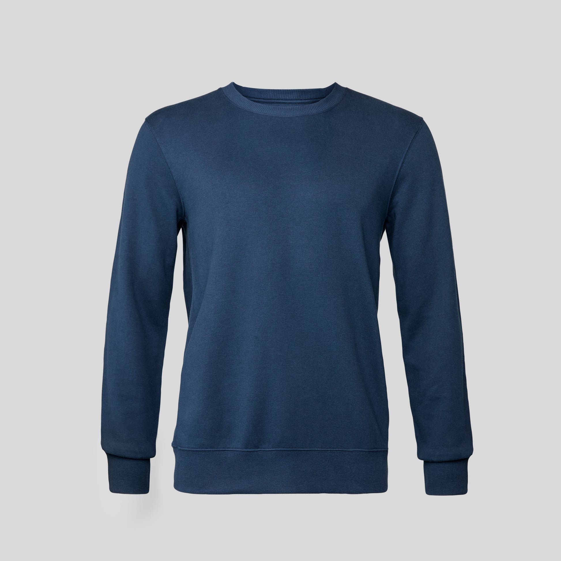The Manmade Blue Sweatshirt on a light gray background