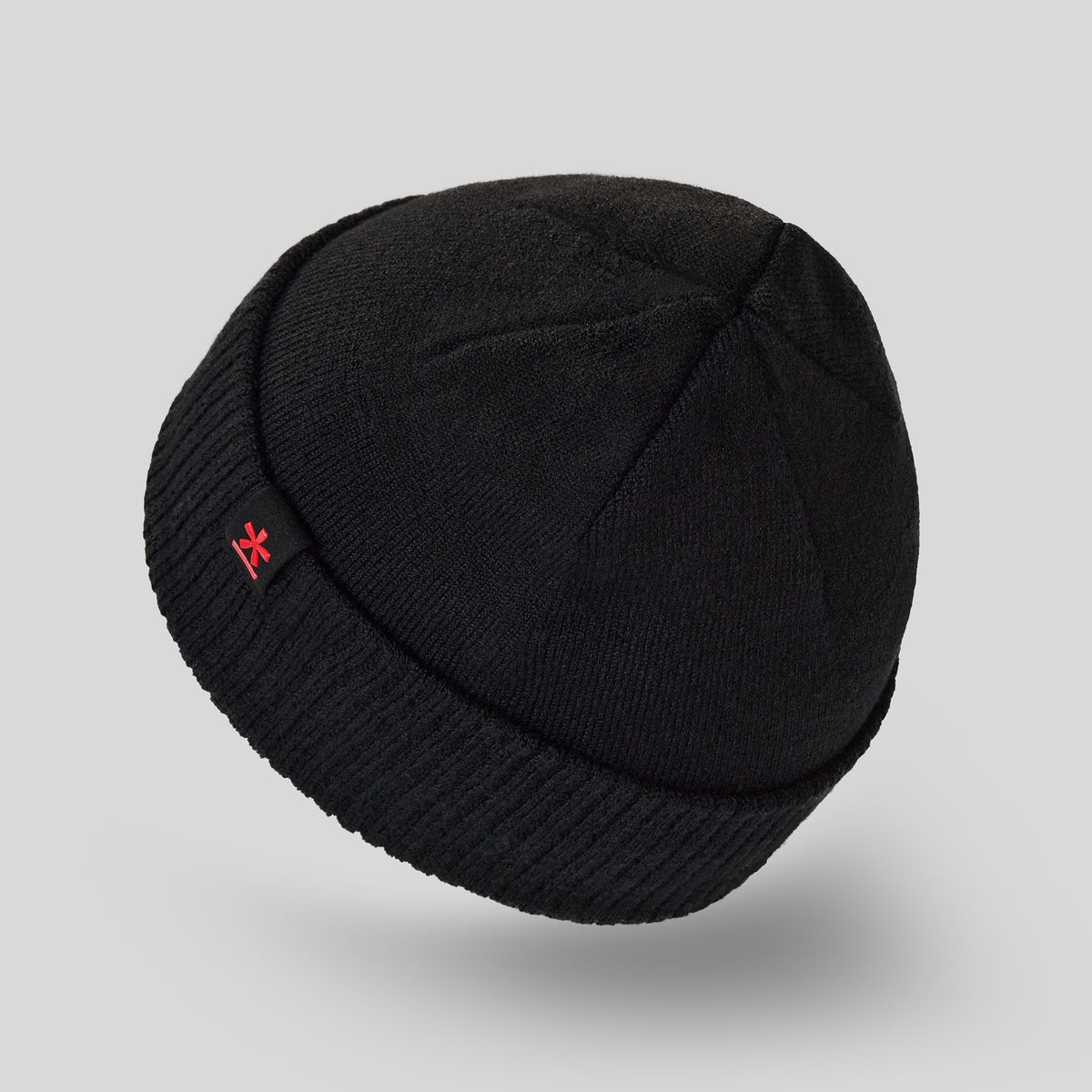 Black Manmade x Kombi Beanie viewed from above.