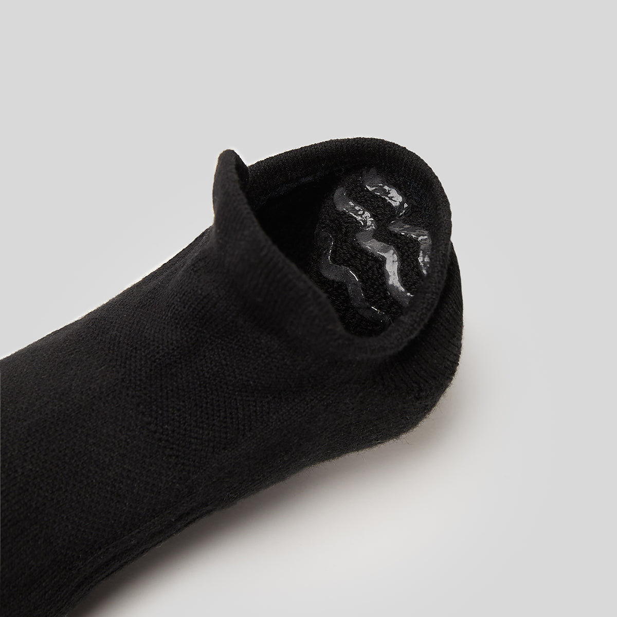 Close view inside the black low cut sock