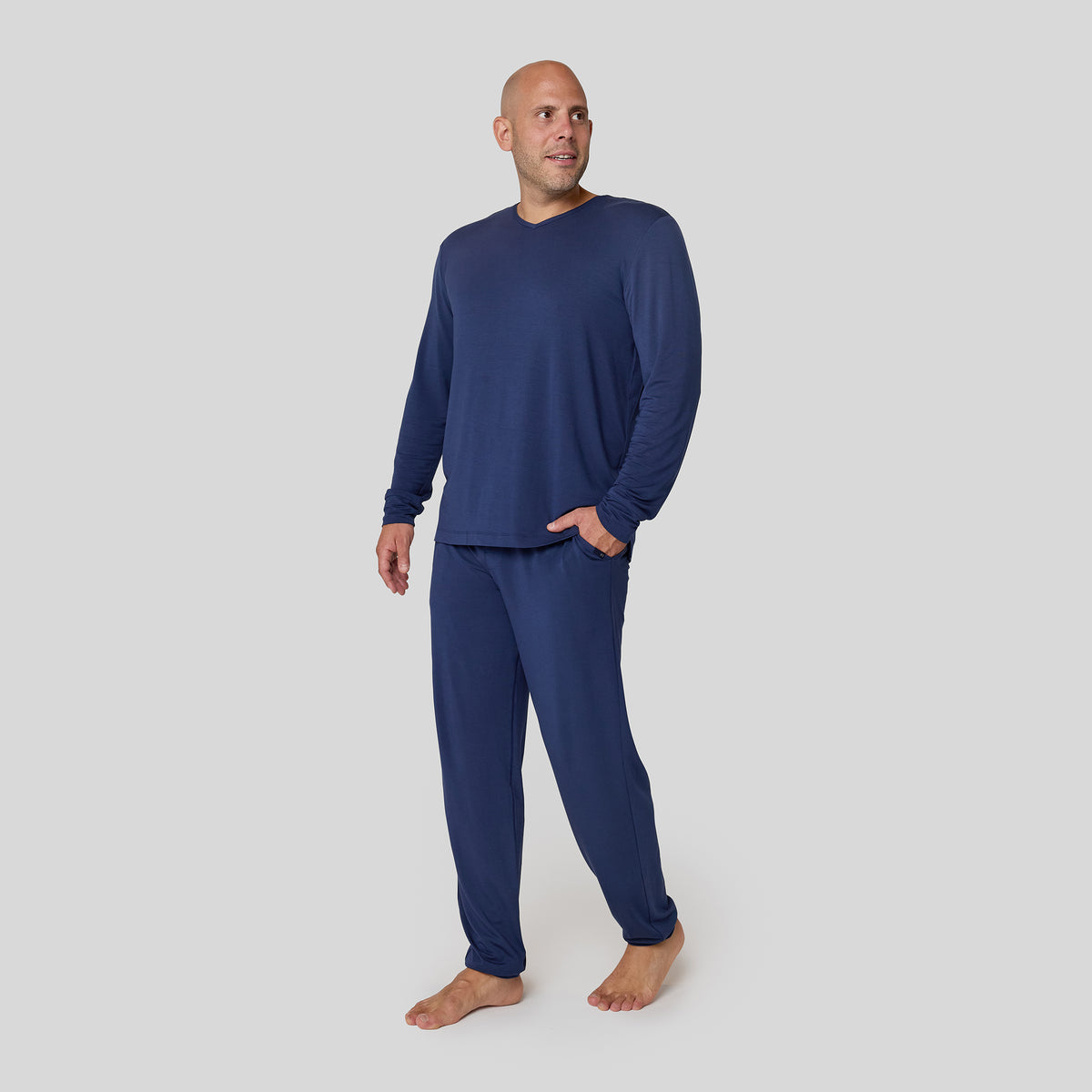Man wearing the blue Manmade Pajama Set.