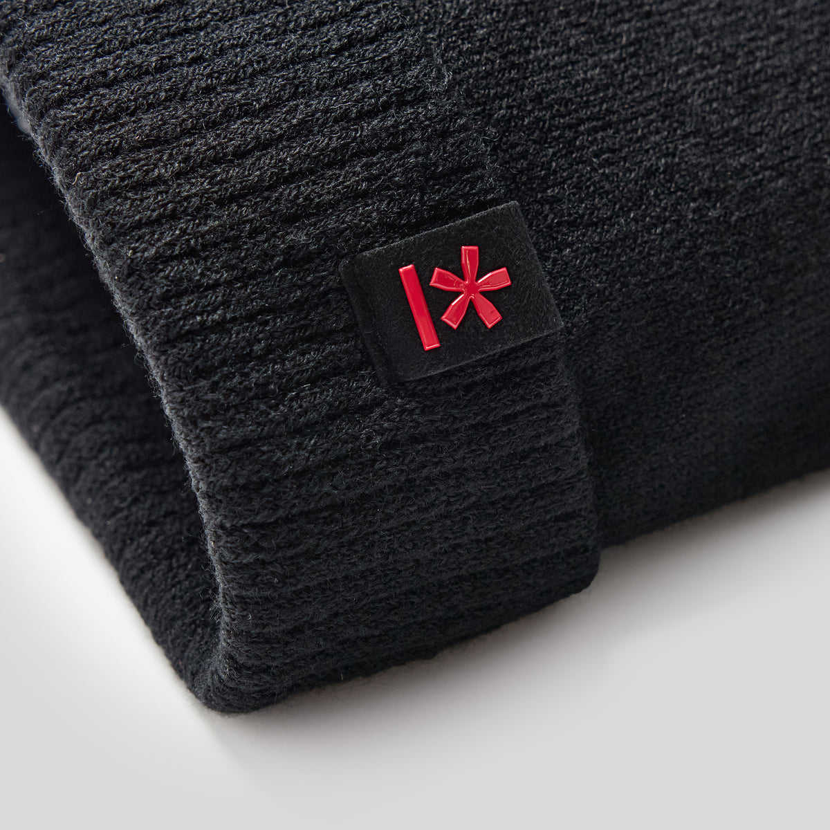 Close up of the Manmade logo on the Beanie.