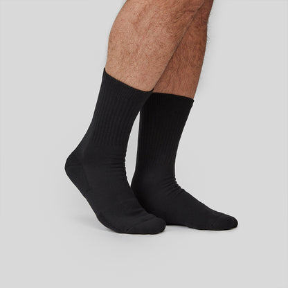 Model with the black crew sock side view