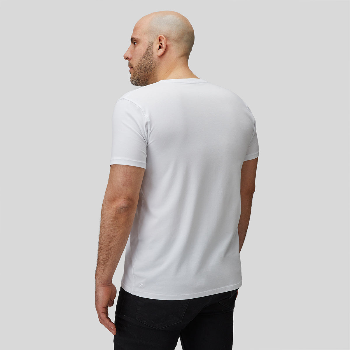 Model with white t-shirt rear angle